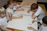Children participating in John Pules Kids APT project, Drawing Words