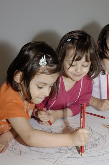 Children participating in John Pules Kids APT project, Drawing Words