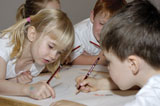 Children participating in John Pules Kids APT project, Drawing Words