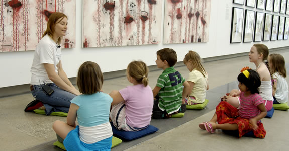 Young visitors tour 'The 5th Asia-Pacific Triennial of Contemporary Art' (APT5) at GoMA 