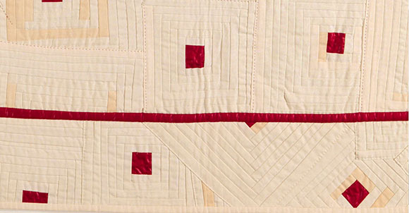 Ruth Stoneley | It's not all sweetness and light (detail) 1983 | Plain cream commercial cotton and red glazed chintz in non-traditional 'log cabin' patchwork | Purchased 1988 | Collection: Queensland Art Gallery